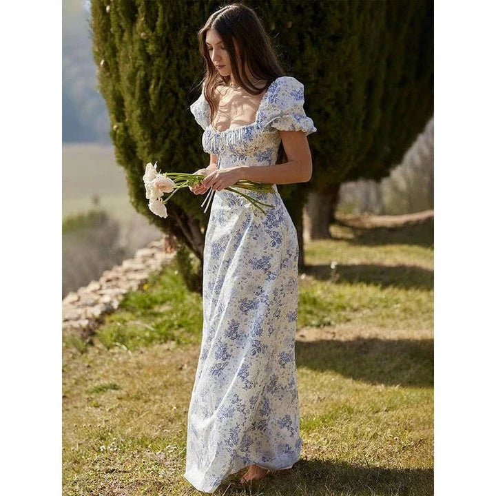 Elegant long maxi summer dress in blue with a flattering fit and flare silhouette, perfect for parties and nights out.