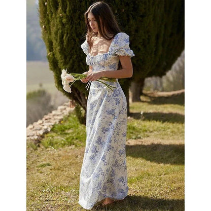 Elegant long maxi summer dress in blue with a flattering fit and flare silhouette, perfect for parties and nights out.