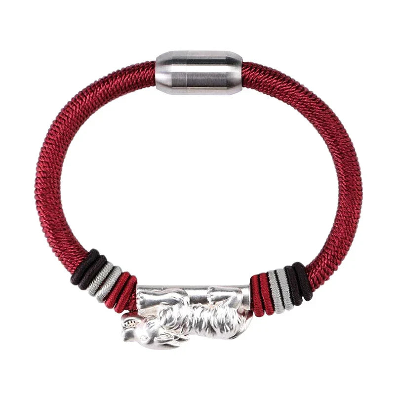 A premium hand-woven bracelet crafted with silver material, featuring a geometric design for a modern and sophisticated look.
