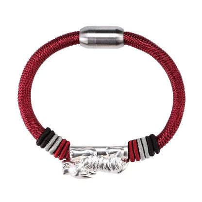 A premium hand-woven bracelet crafted with silver material, featuring a geometric design for a modern and sophisticated look.