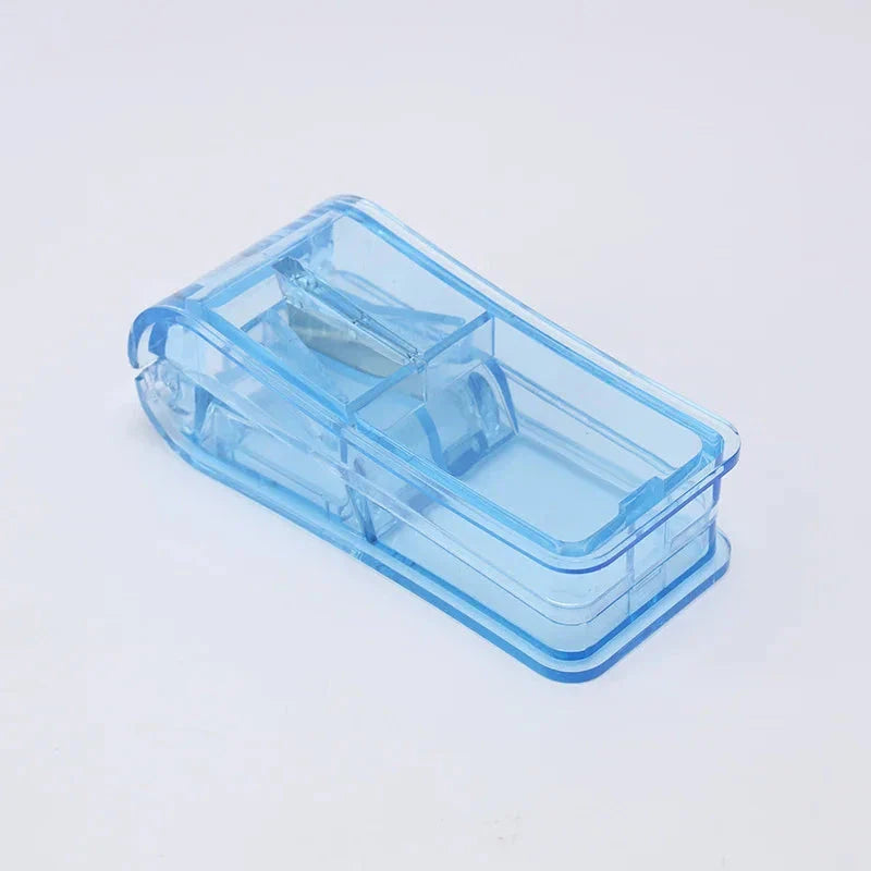 Compact Pill Splitter and Storage Organizer with Orange Colour, Featuring Precision Cutting Blade and Built-in Storage Compartment