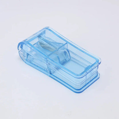 Compact Pill Splitter and Storage Organizer with Orange Colour, Featuring Precision Cutting Blade and Built-in Storage Compartment