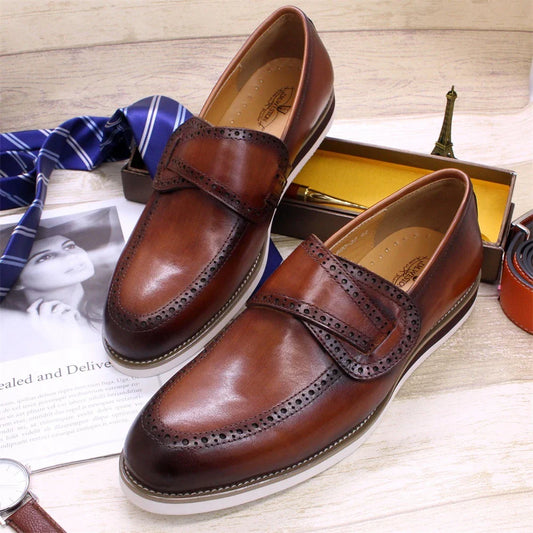 Premium handcrafted British leather casual loafers for men, featuring a round toe, flat heel, and durable rubber sole