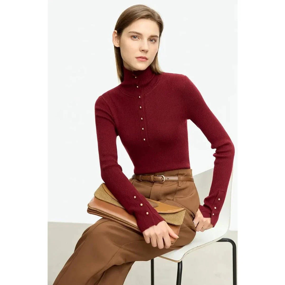 Elegant, slim-fit turtleneck sweater in various colours with chic button detail, perfect for the modern British woman's autumn wardrobe