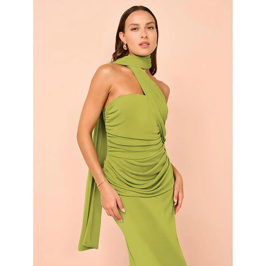 Elegant halter backless ankle-length bodycon dress in a solid colour, designed to flatter the figure and create a sophisticated, eye-catching look for formal events.