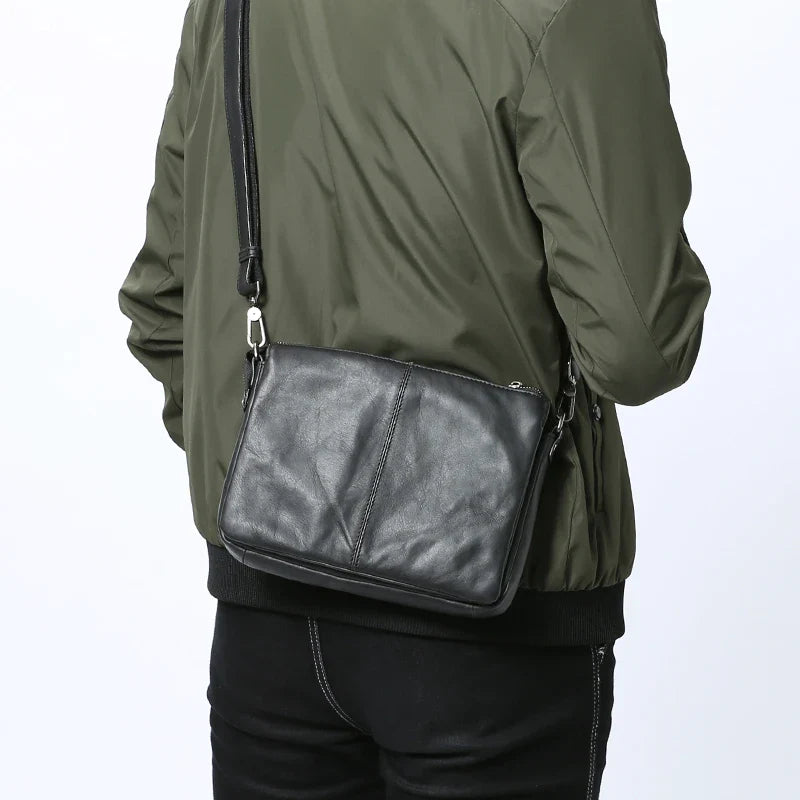 Premium cowhide leather crossbody bag with versatile internal compartments, perfect for the modern British fashionista