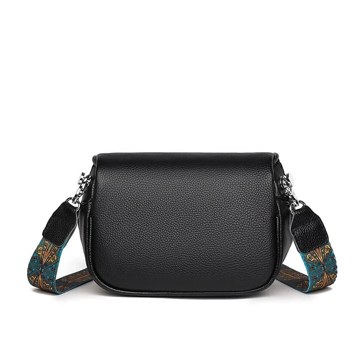Premium genuine leather tote bag with adjustable strap and interior compartments for fashion-forward women