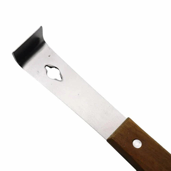 Stainless steel honey scraper with wooden handle, a versatile tool for beekeepers in the UK
