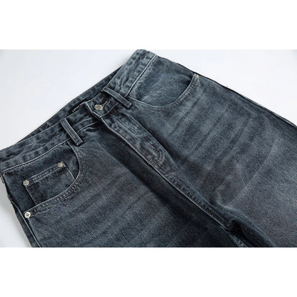 A pair of stylish retro-inspired Japanese jeans in black and grey, featuring a mid-rise waist and straight leg silhouette for a flattering, comfortable fit.