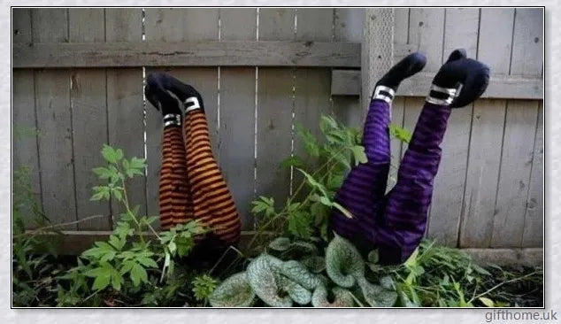 Animated witch legs in various colours, including purple, yellow, and black and white, kicking and moving to create a spooky Halloween display