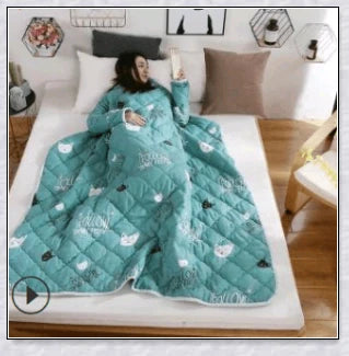 A cosy, wearable quilt with sleeves in a variety of colourful designs, perfect for staying warm and comfortable during the winter months.