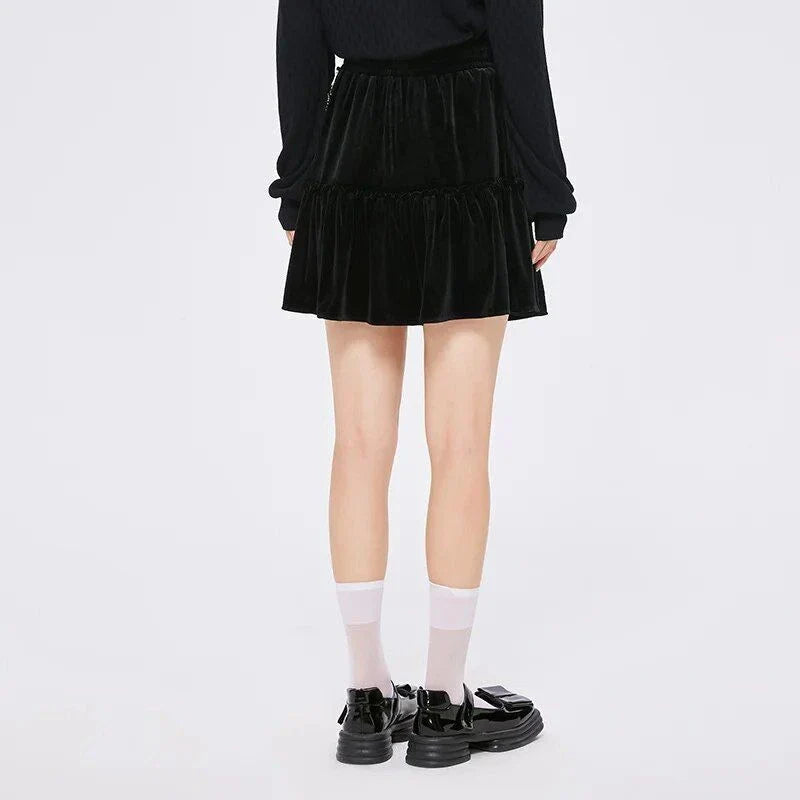 A stylish and playful above-knee mini skirt with intricate chain detailing, offering a versatile and fashionable addition to any wardrobe.
