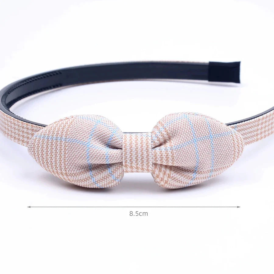 Charming bow headband for girls, a stylish hair accessory made from high-quality canvas and rubber for a comfortable, secure fit