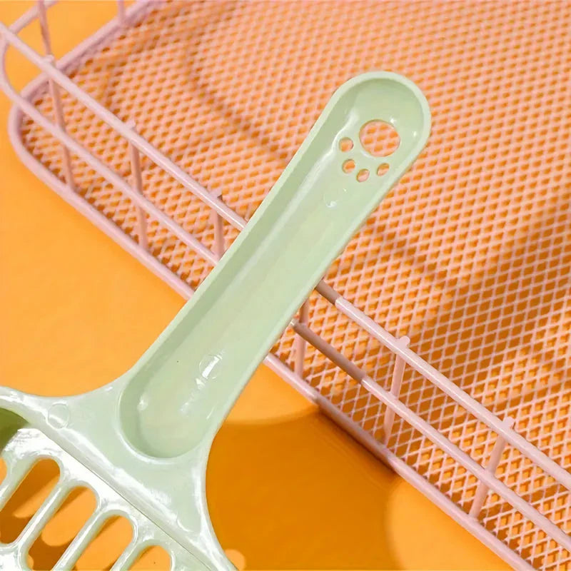 A large, high-quality cat litter scoop made of durable plastic with a hollow design for efficient cleaning.