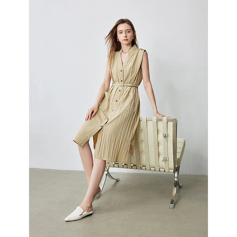 Elegant sleeveless midi shirt dress with V-neck and side pockets, perfect for summer in the UK