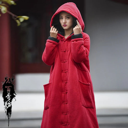 Hooded witch robe in red, featuring a cosy, wrinkle-resistant cotton and linen blend fabric with retro-inspired design details