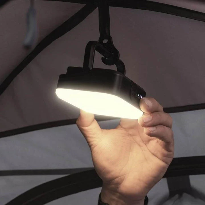 A versatile LED camping lantern with various lighting modes and a magnetic base, perfect for outdoor adventures and emergency situations.