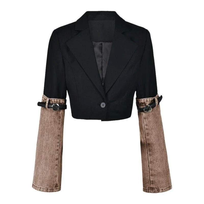 A stylish denim patchwork blazer with a notched collar and single-button closure, designed for the modern British woman