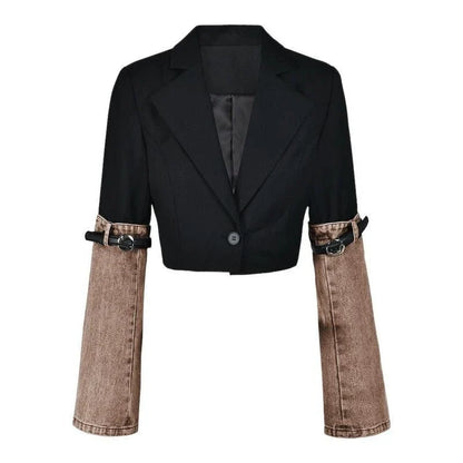 A stylish denim patchwork blazer with a notched collar and single-button closure, designed for the modern British woman