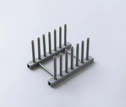 A sleek and compact dish organiser made with durable ABS material, designed to streamline kitchen storage and add elegance to your space.