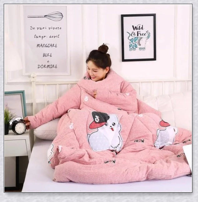 A cosy, wearable quilt with sleeves in a variety of colourful designs, perfect for staying warm and comfortable during the winter months.
