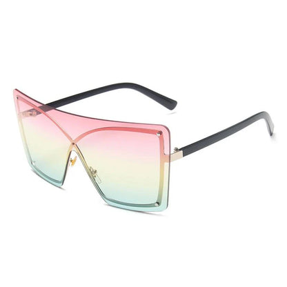 Fashionable oversized flat top sunglasses with gradient lenses and a sleek, rimless plastic frame