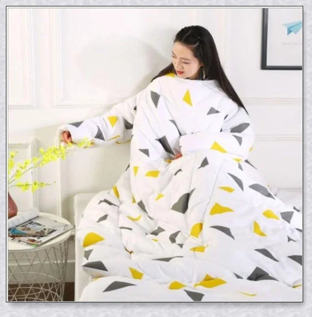 A cosy, wearable quilt with sleeves in a variety of colourful designs, perfect for staying warm and comfortable during the winter months.