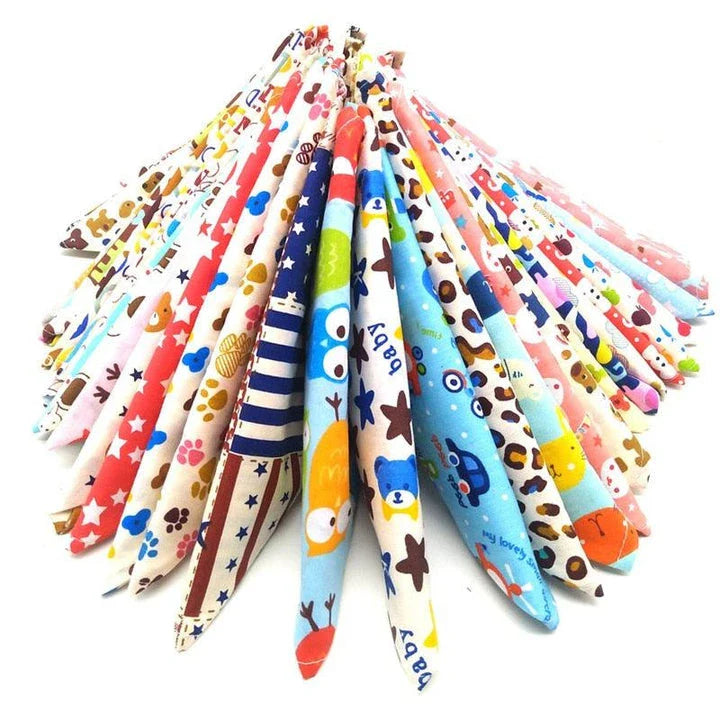 Vibrant patterned cotton dog scarves in a variety of stylish designs, perfect for keeping your canine companion warm and fashionable.