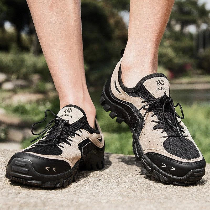 Couple wearing durable British-made mesh hiking shoes exploring the outdoors