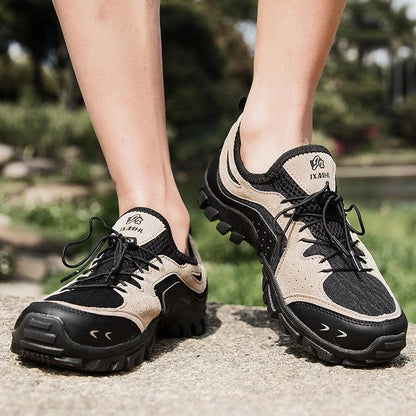 Couple wearing durable British-made mesh hiking shoes exploring the outdoors