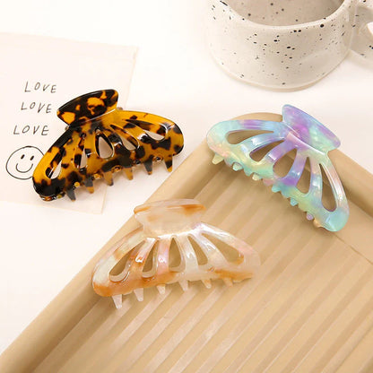 Chic geometric hollow stripes hair barrettes in beige colour, made from premium acetate for durable and comfortable wear