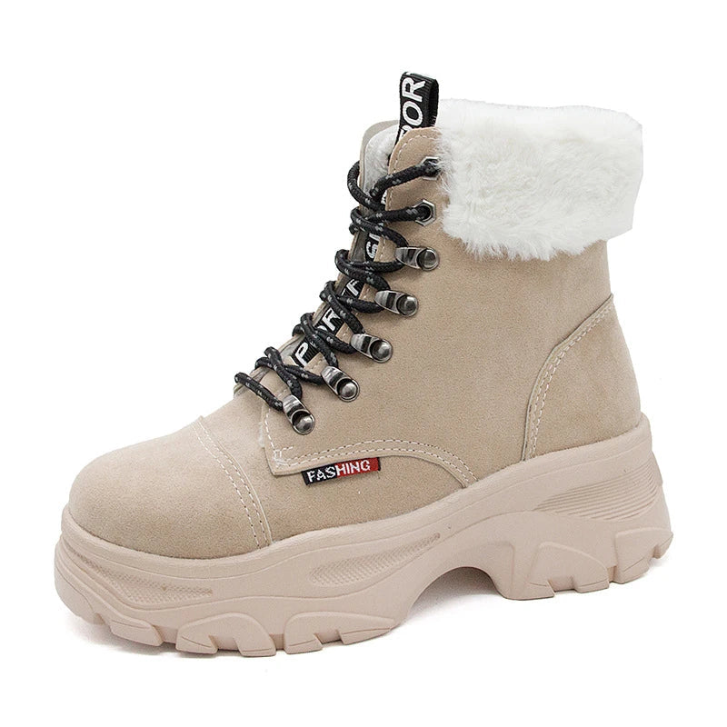 Stylish British platform boots with faux suede upper, lace-up closure, and wedge heel design
