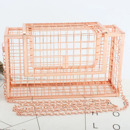A sophisticated British-designed metal mesh clutch bag with a chain strap, available in various colours and chain styles