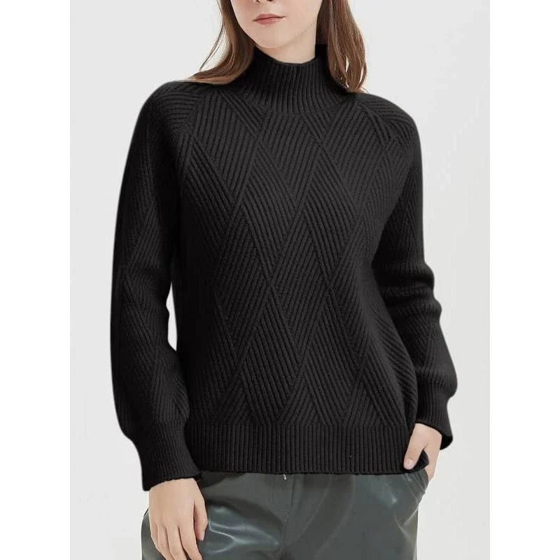 A cosy and stylish knitted turtleneck sweater in a classic beige colour, perfect for layering during the autumn and winter seasons.