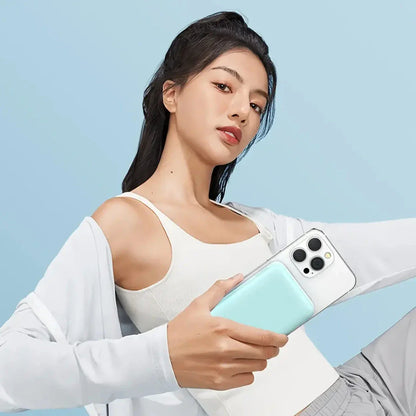 High-capacity magnetic power bank with wireless fast charging and built-in cables, providing 10,000mAh of reliable power for mobile devices.