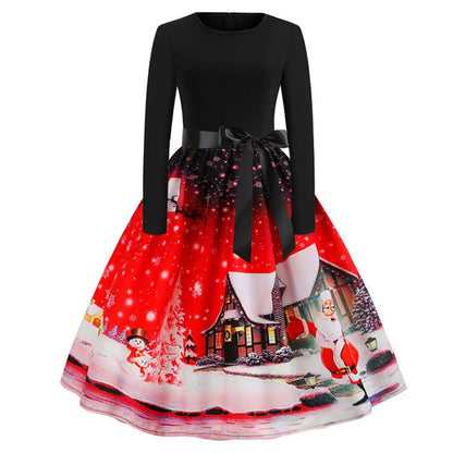 A festive, vintage-inspired Christmas dress with a vibrant retro print, flowing swing skirt, and long sleeves for a timeless, feminine look.