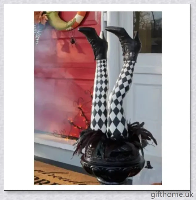 Animated witch legs in various colours, including purple, yellow, and black and white, kicking and moving to create a spooky Halloween display