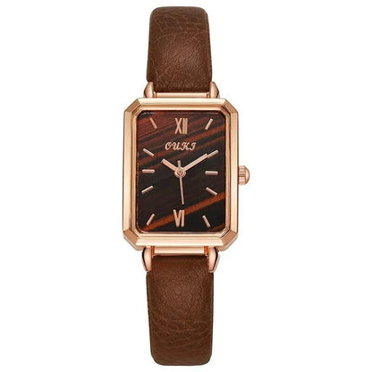 Refined square dial ladies watch with genuine leather strap, minimalist design, and durable aluminium alloy case