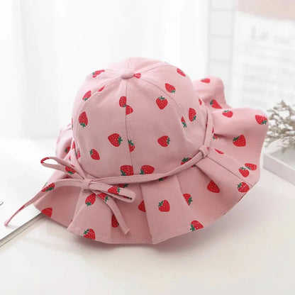 Adjustable white cotton sun protection bucket hat with cartoon pattern for children