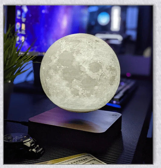 Lunamen Magnetic Levitating Moon Lamp with detailed lunar surface and floating above magnetic base