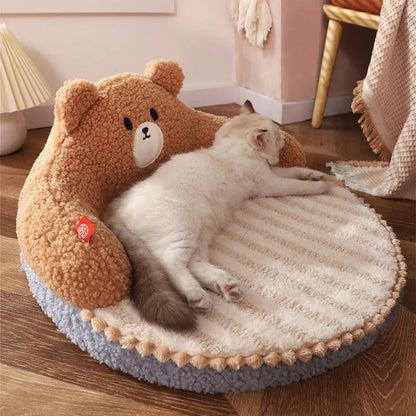 Cosy bear-shaped pet bed in pink colour, designed for cats and small dogs up to 16.5 lbs, with a plush, supportive interior and removable, washable mat.