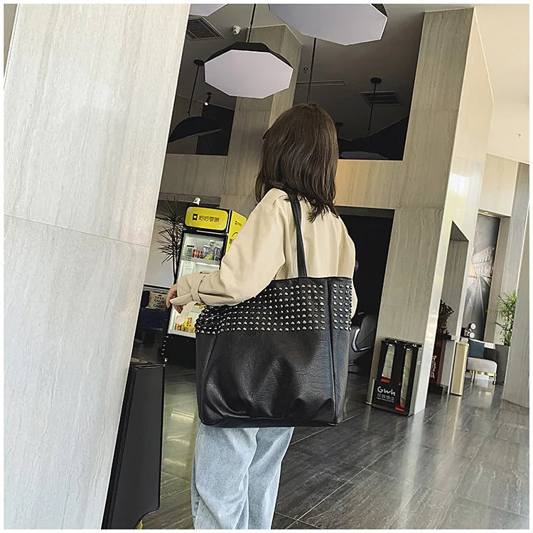 Premium British leather tote bag in black, featuring a large capacity design and stylish, versatile appeal.