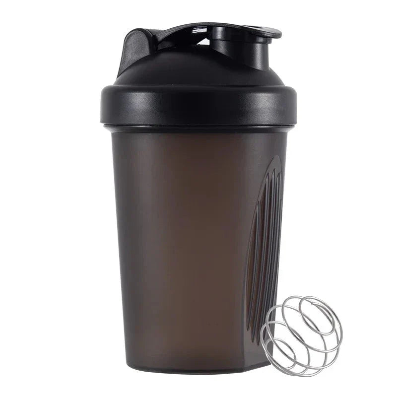 Premium protein shaker bottle with stainless steel whisk ball, BPA-free plastic, and leak-proof design for on-the-go fitness enthusiasts in the UK.