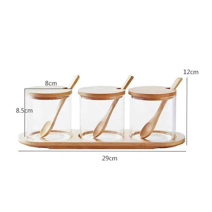 Premium glass and wooden storage jars with serving spoons, featuring a sleek design and airtight seal for fresh and organised kitchen storage