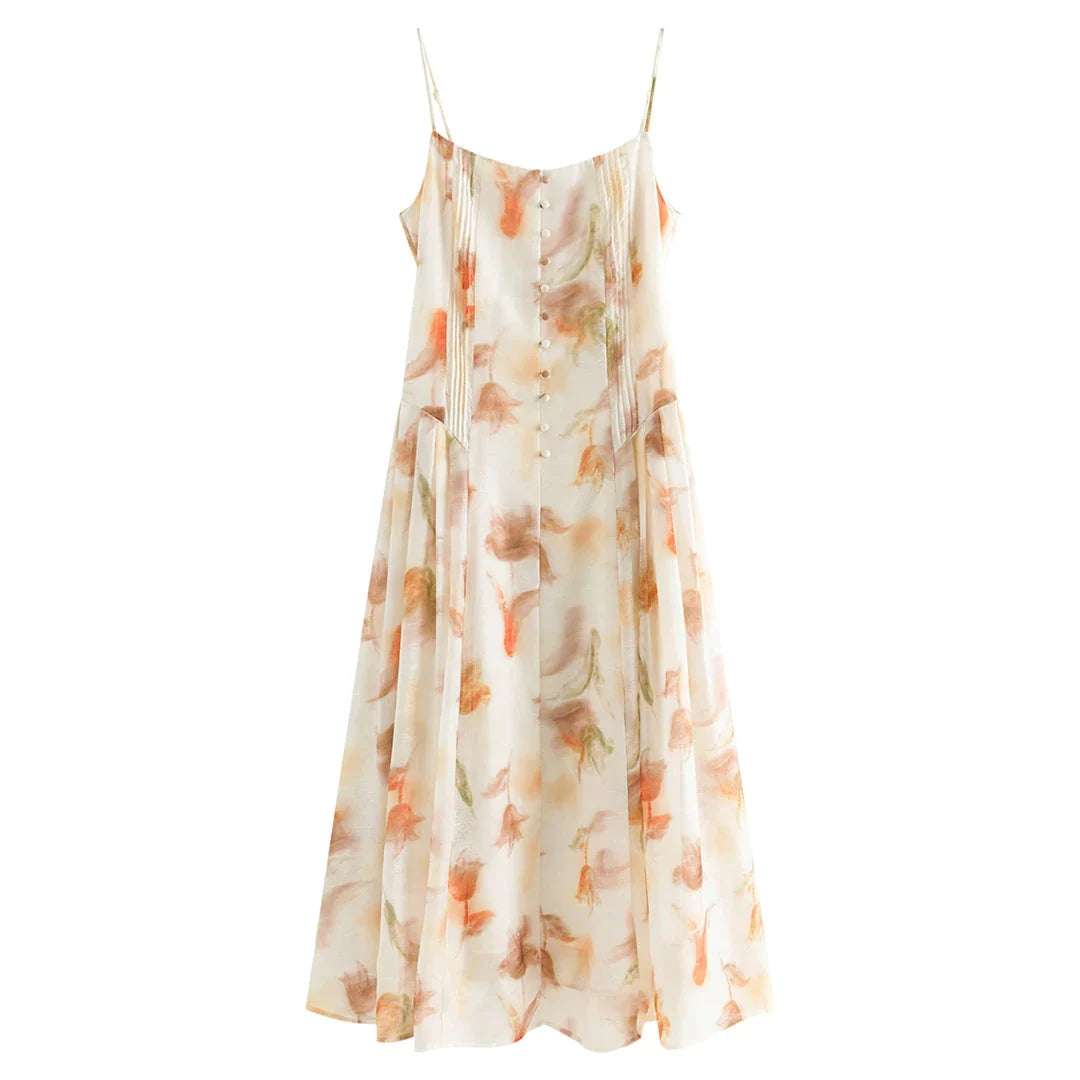 Floral sleeveless summer dress with A-line silhouette and vibrant orange print, perfect for British summer occasions
