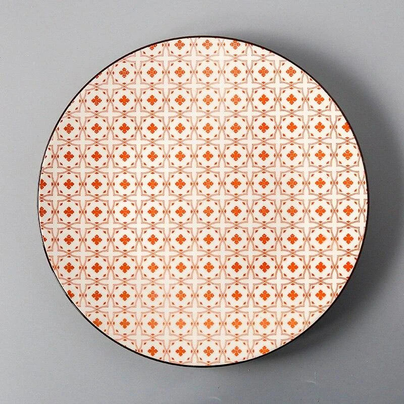 Elegant ceramic plates with vibrant, whimsical prints in a variety of enchanting designs