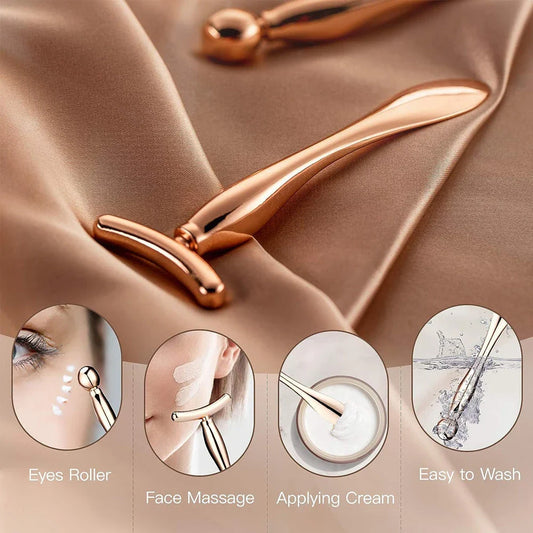 A rose gold metal eye cream applicator and face massager tool with a Y-shaped design for effective skincare application and facial massage