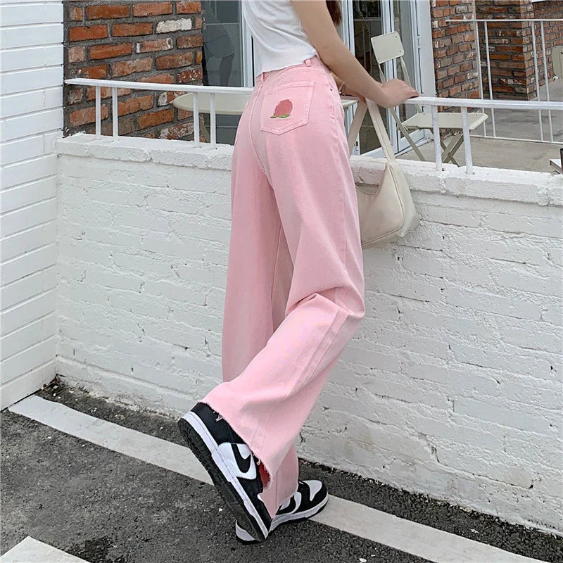 Premium cotton denim high-waist wide-leg trousers in a flattering, figure-hugging silhouette
