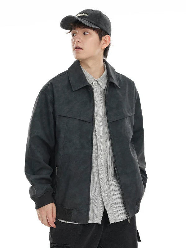 A classic distressed leather jacket in a relaxed, unstructured fit suitable for both men and women