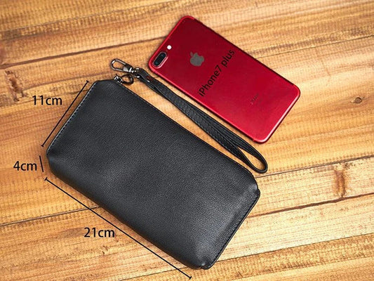 Premium genuine leather handbag in a sleek, contemporary design with secure zipper closure and internal organisation pockets
